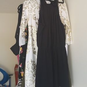 Black romper with a tie back